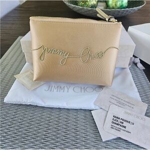 Jimmy Choo Satin Champagne Pouch
NWT/NIB COA